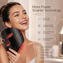 Woman holding ergonomic red light therapy face mask for skincare