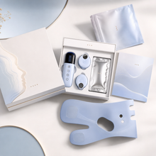 Complete EMS facial contour device kit with controller, accessories, and packaging