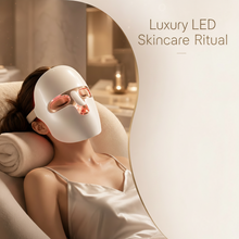Woman relaxing while wearing LED face mask light therapy device